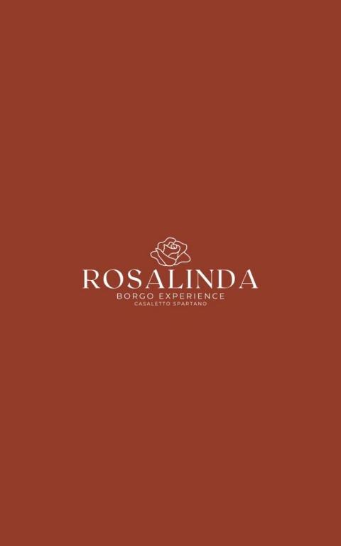 a logo for ross island a book store at ROSALINDA - Borgo Experience Cilento in Casaletto Spartano