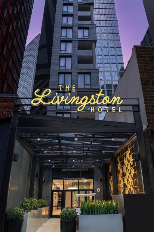 a sign for the entrance to a hotel at The Livingston, part of JdV by Hyatt in Brooklyn