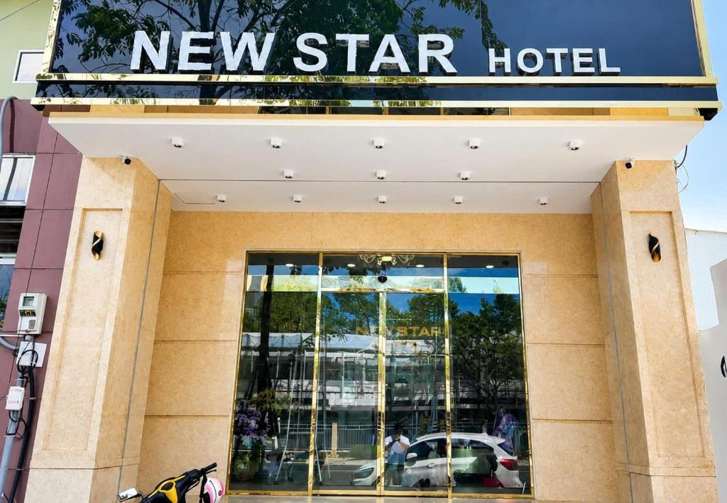 a new star hotel sign on the front of a building at New Star Hotel Tay Ninh in Tây Ninh