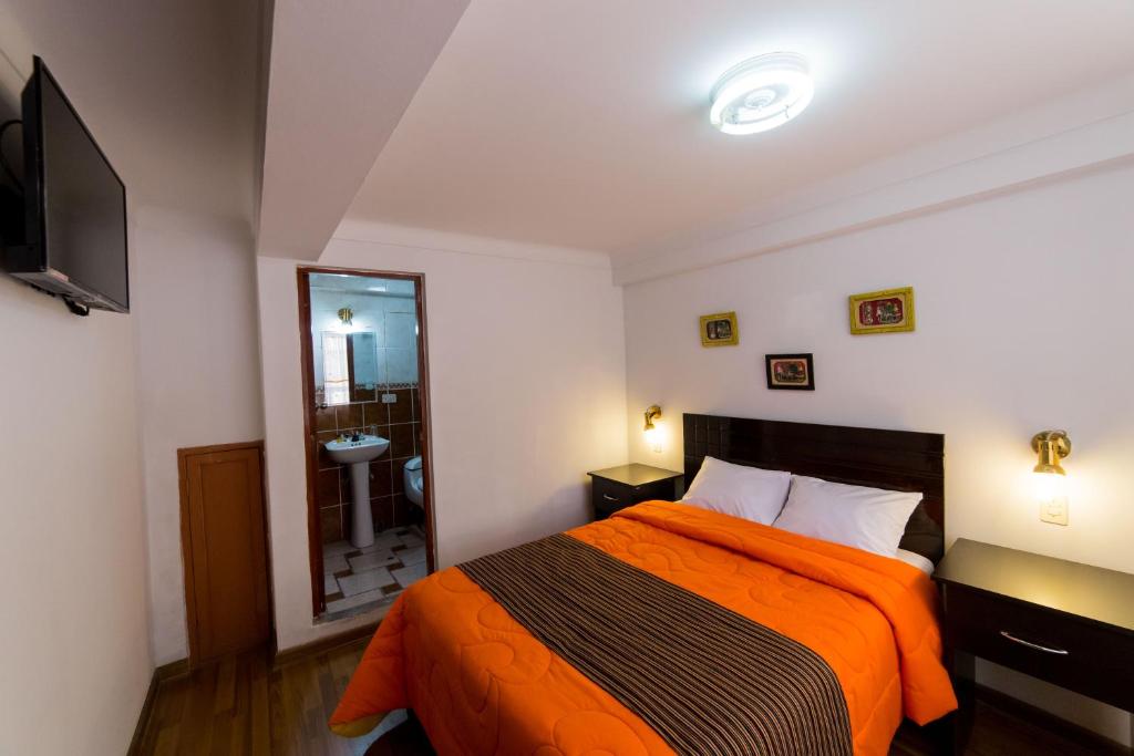 TV a/nebo společenská místnost v ubytování Hotel Peru Real