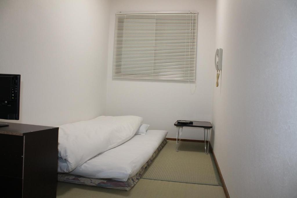 Postel nebo postele na pokoji v ubytování Hotel Beaver 2