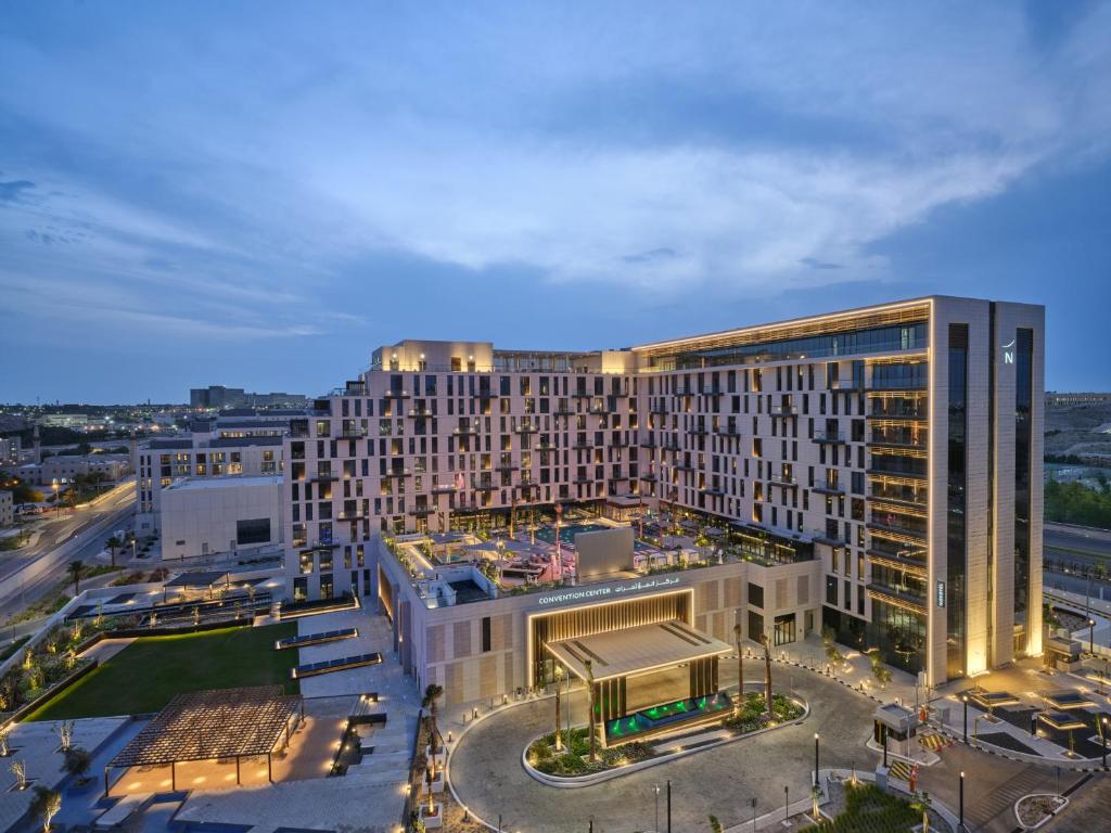 an overhead view of a large building in a city at Novotel Dhahran Hotel & Residences in Dhahran