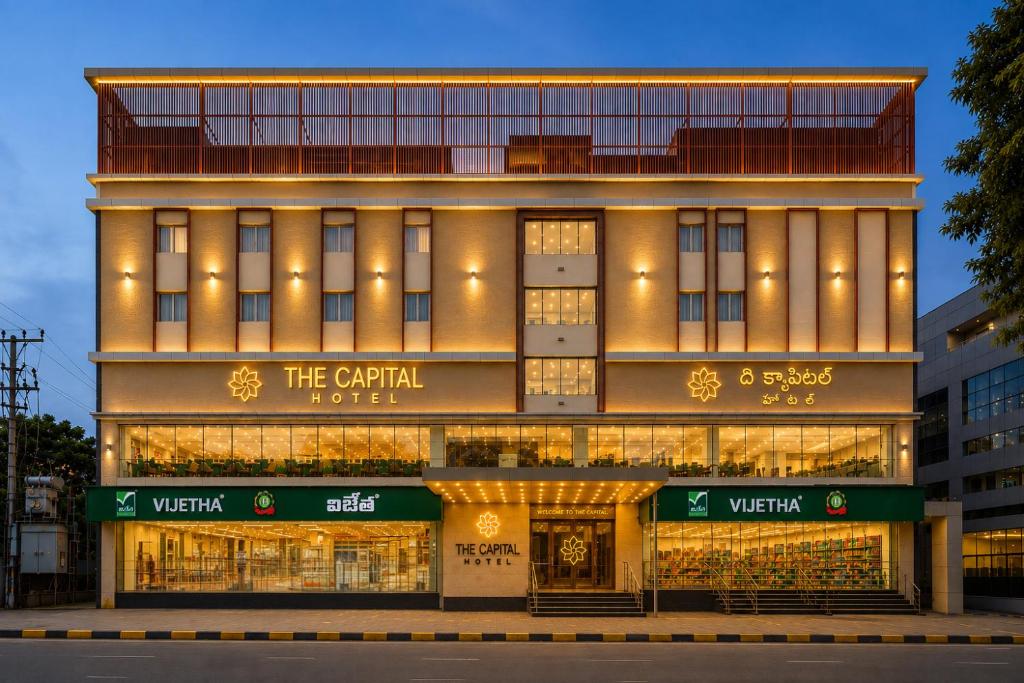 a store front of a building with lights at The Capital Hotel in Guntūr