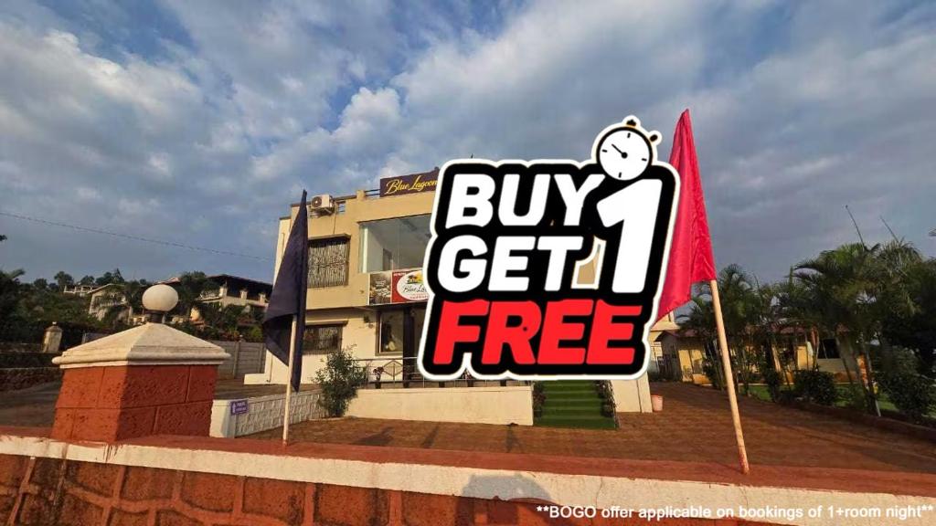 a buy get free sign in front of a building at Collection O Sunset Point Pangari Formerly Riveria in Mahabaleshwar