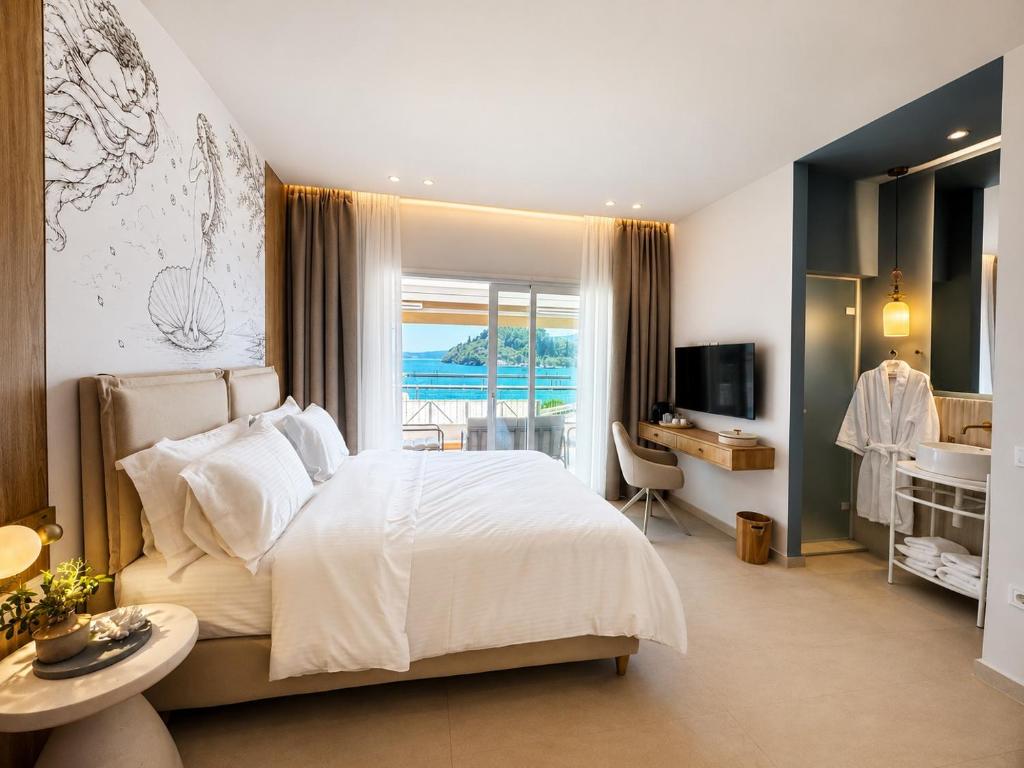 a bedroom with a bed and a view of the ocean at Ventora Suites in Nydri