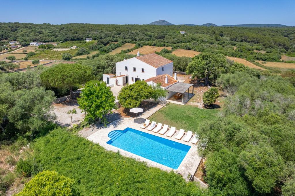 an aerial view of a villa with a swimming pool at Finca Biniatzau by 3VILLAS in Alaior