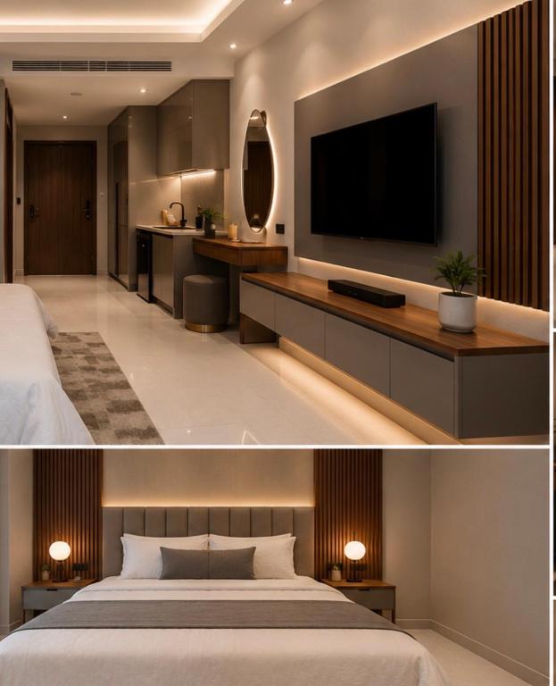 a hotel room with a bed and a flat screen tv at The Novaire in Lucknow