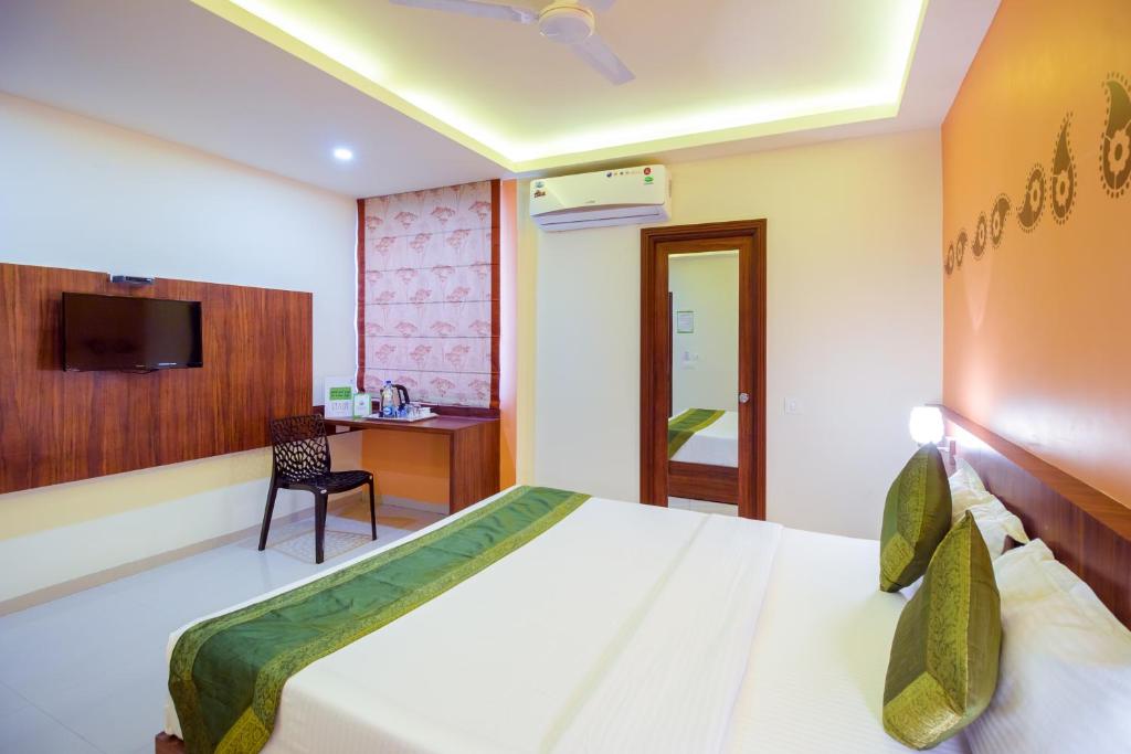 Postel nebo postele na pokoji v ubytování Itsy Hotels Arastu Inn
