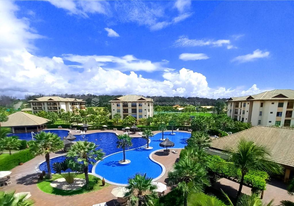 an aerial view of a resort with two pools at VG Sun Cumbuco in Cumbuco