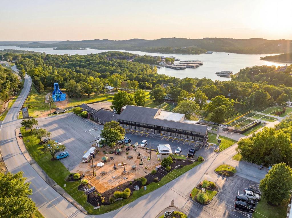 an aerial view of a building with a park at Suites at Waterside in Branson