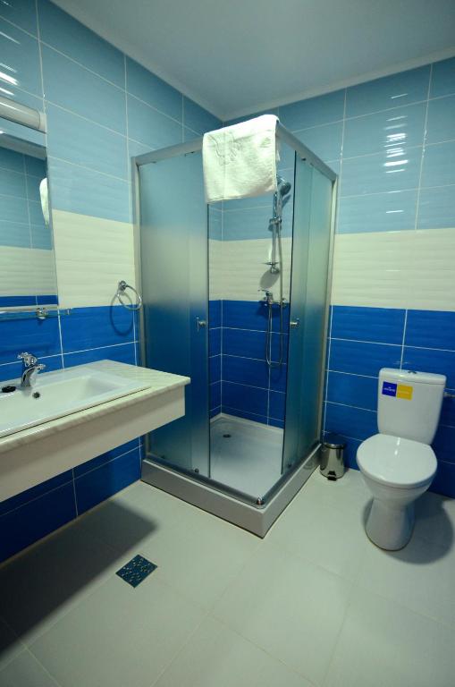 Koupelna v ubytování Pensiunea Kemsilvanum Fort Silvan