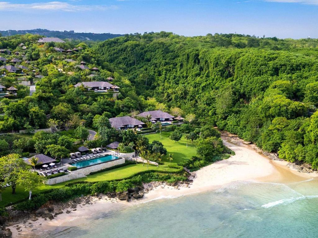 an aerial view of a resort with a beach at Raffles Bali in Jimbaran
