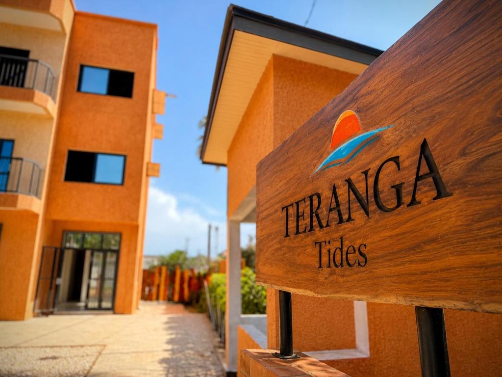 a sign for a tamarica tiles building at Teranga Tides in Bijilo