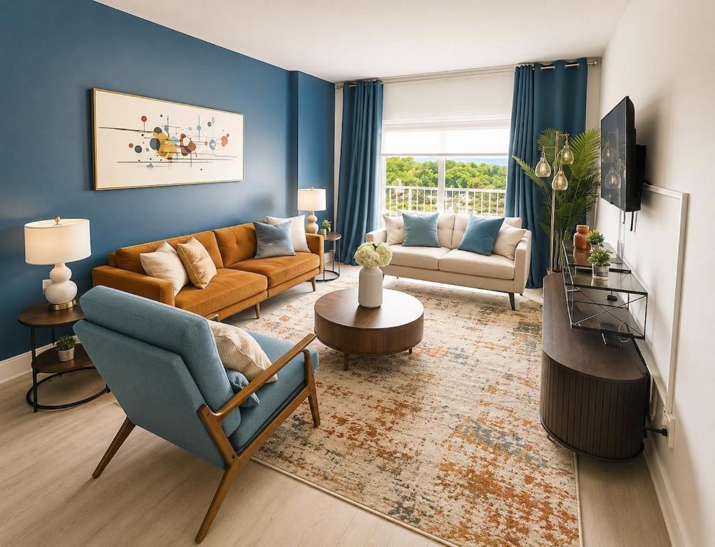 a living room with a couch and a chair at Coastal Retreat Near Hollywood Beach & Casinos in Hallandale Beach