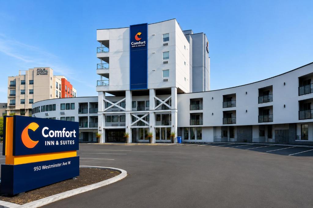 a building with a sign in front of it at Comfort Inn & Suites in Penticton