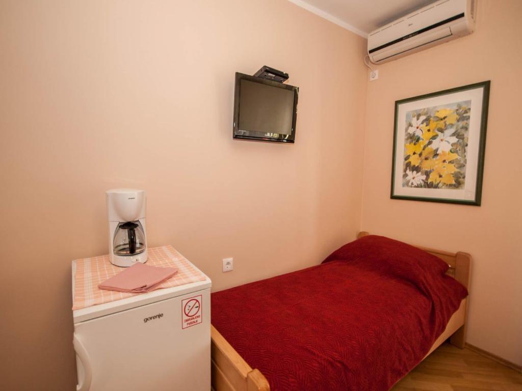Posteľ alebo postele v izbe v ubytovaní Rooms Nadica
