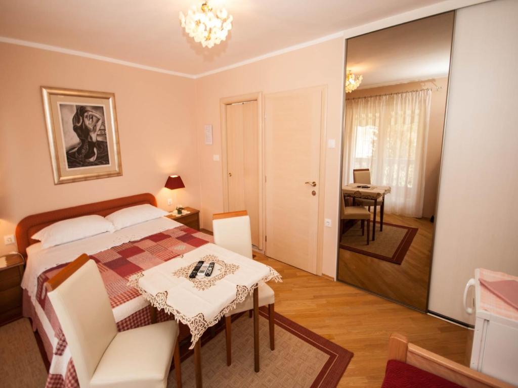 Posteľ alebo postele v izbe v ubytovaní Rooms Nadica