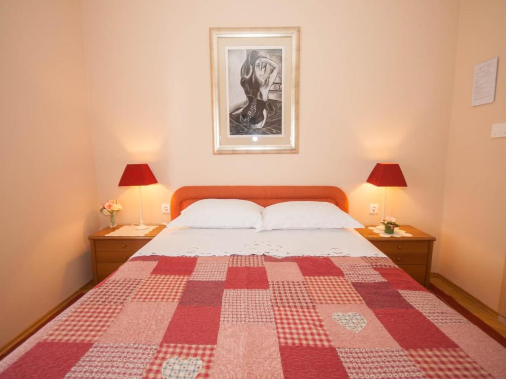 Posteľ alebo postele v izbe v ubytovaní Rooms Nadica