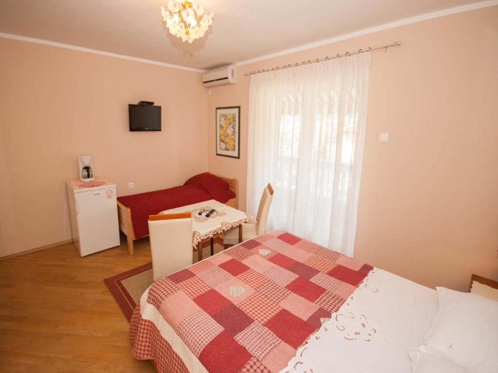 Posteľ alebo postele v izbe v ubytovaní Rooms Nadica