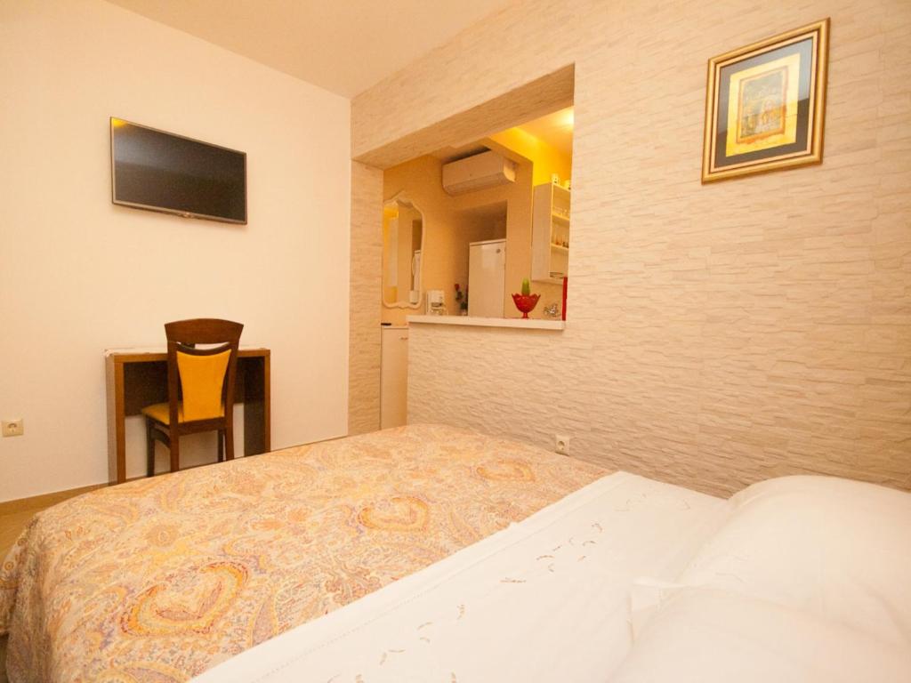 Posteľ alebo postele v izbe v ubytovaní Rooms Nadica