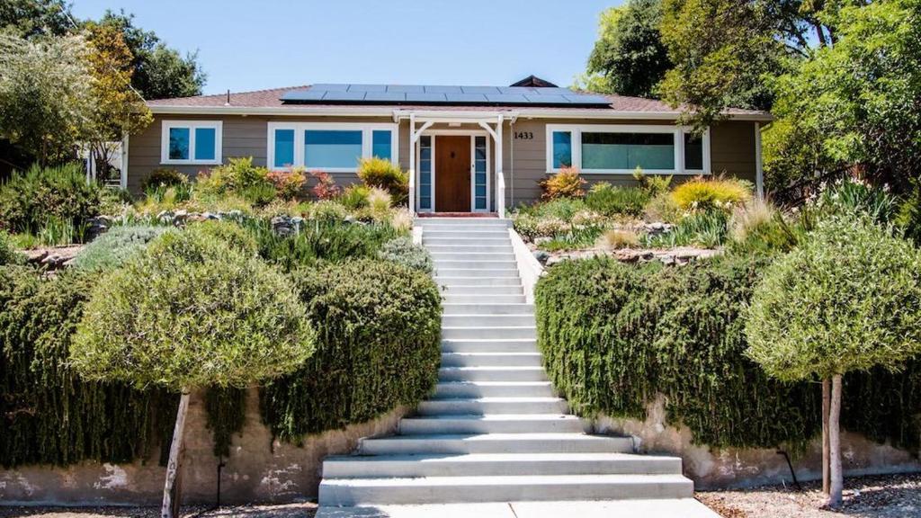 a house with a staircase leading up to the front door at Two Sweet by AvantStay in Paso Robles