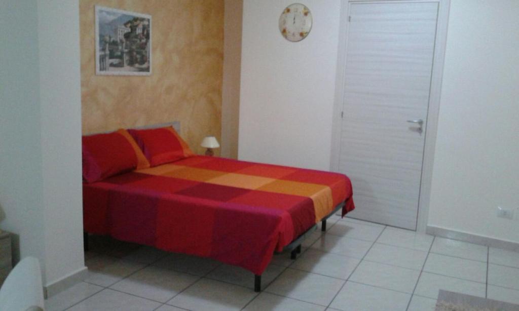 Postel nebo postele na pokoji v ubytování B&B Le Tre Gemme Junior