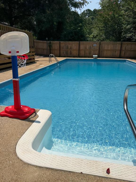 a large swimming pool with a red pole in it at Blindfrog in Scottsboro