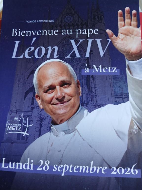 a magazine with a picture of president barack obama at Auberge leon xiv in Sarralbe