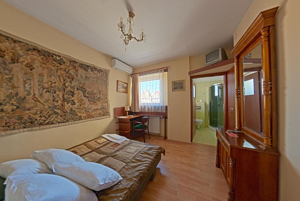 Posteľ alebo postele v izbe v ubytovaní Hotel Alef