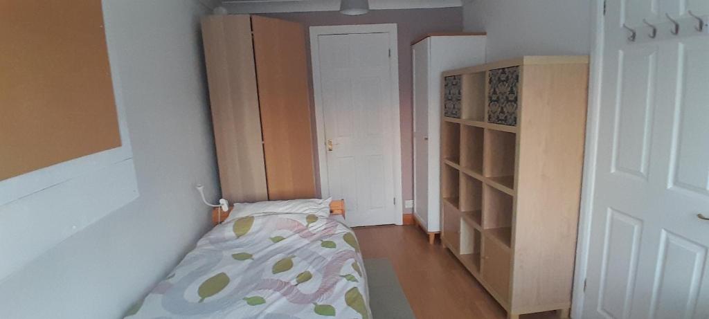 Postel nebo postele na pokoji v ubytování Thameside Corner