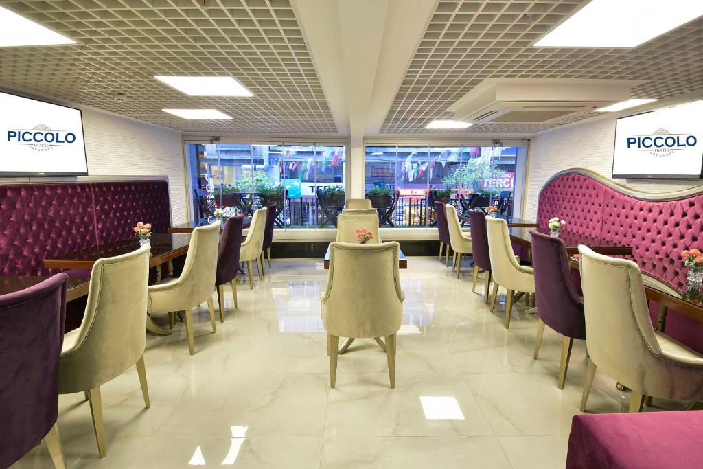 A seating area at Adamel City Hotel