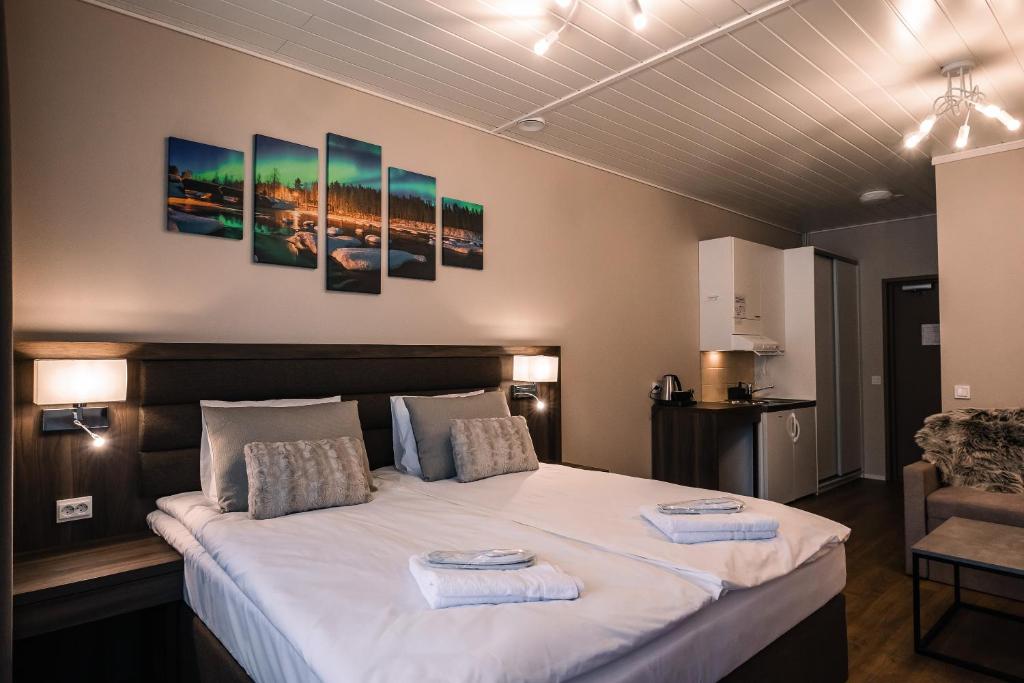 Кровать или кровати в номере Hotel Boreas