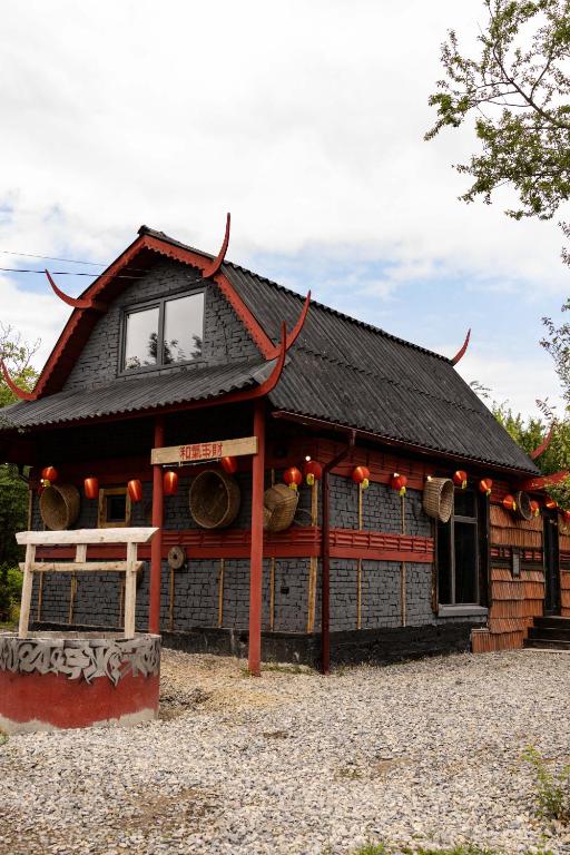a building with a sign on the front of it at Netri SPA in Zofʼyuvka