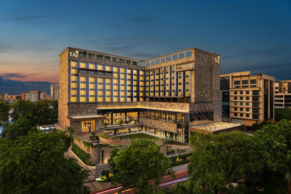 a rendering of a large building in a city at Taj Palace, Lucknow in Lucknow