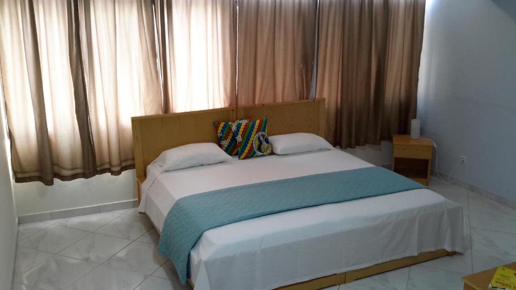 Postel nebo postele na pokoji v ubytování LT Aparthotel