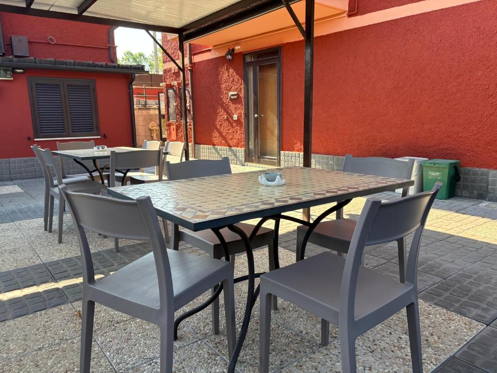 a table and chairs sitting on a patio at Giorno&Notte Colleferro in Colleferro