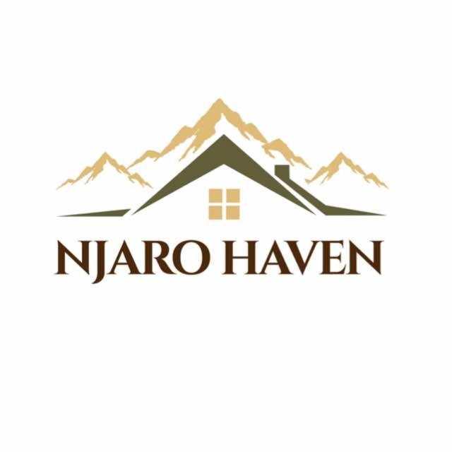 a logo of a house with mountains in the background at Njaro Haven in Weru Weru