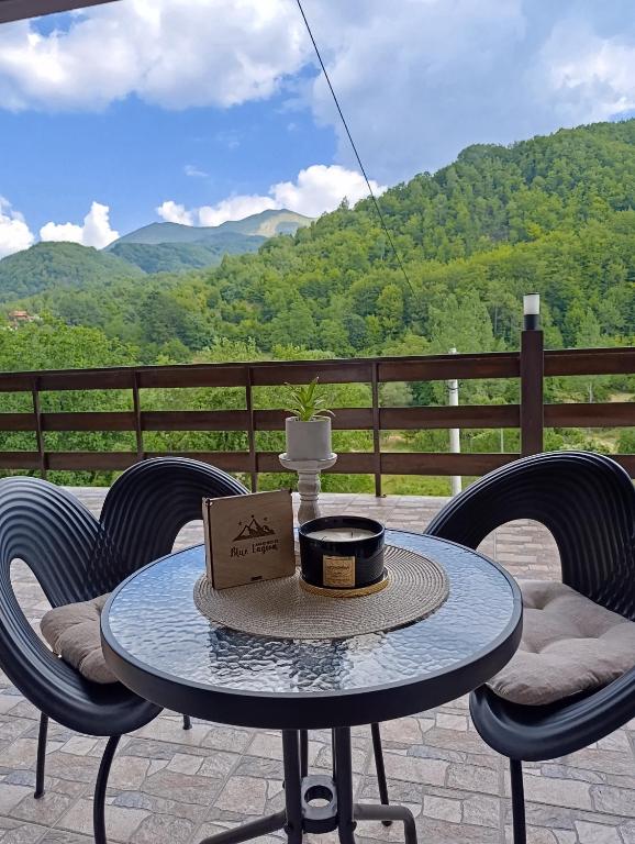 a table with a box on it on a patio at Blue Lagoon Apartments in Crni Vrh