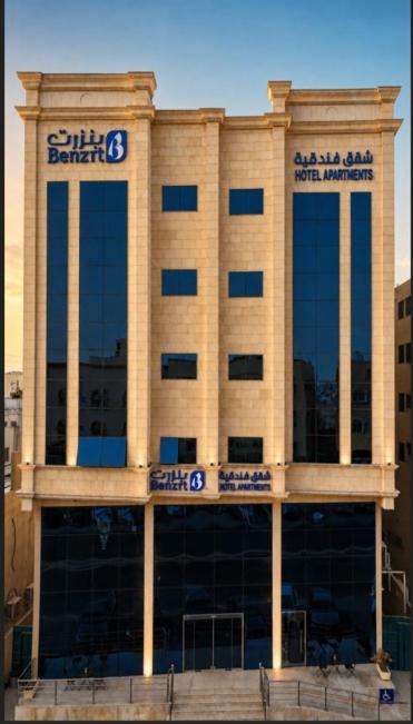 a large building with windows on the front of it at بنزرت للشقق الفندقية in Al Hofuf