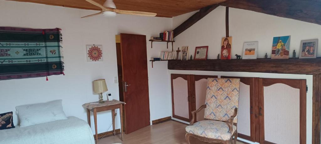 a living room with a fireplace and a couch at Domaine de Béchegut in Marval