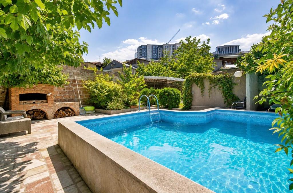 a swimming pool in the backyard of a house at Villa in the center of Yerevan in Yerevan
