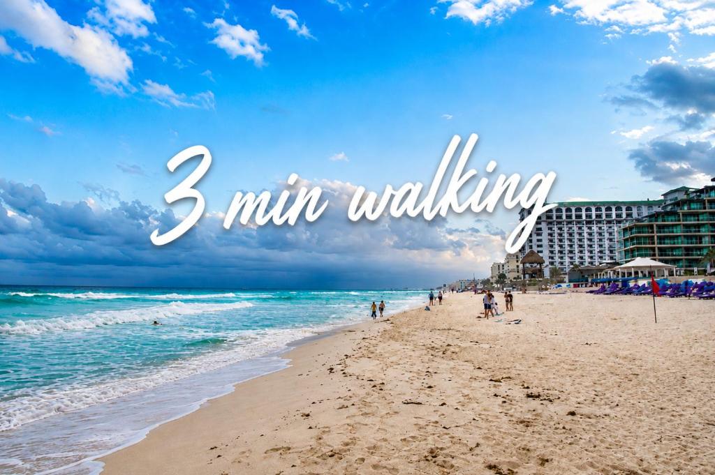 a picture of a beach with the words mile walking at Ocean Bloom in Cancún