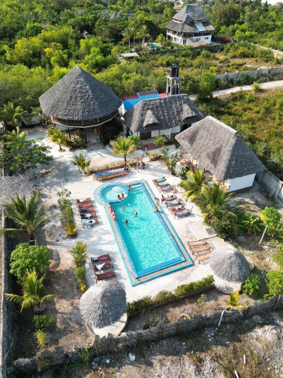 an aerial view of a resort with a swimming pool at Gavana House in Mfumbwi