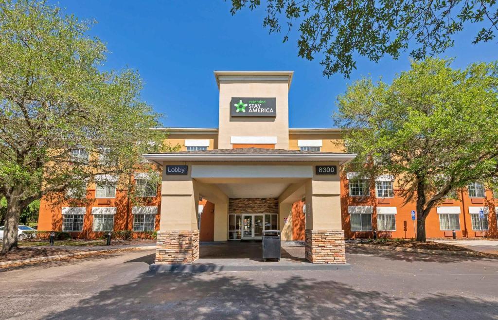 a rendering of the front of a building at Extended Stay America Select Suites - Jacksonville - Baymeadows in Sunbeam