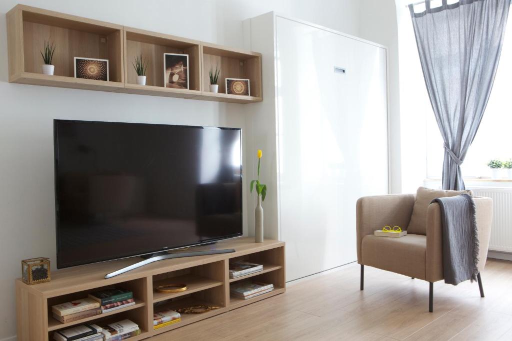 Telewizja i/lub zestaw kina domowego w obiekcie Premium Class Apartments