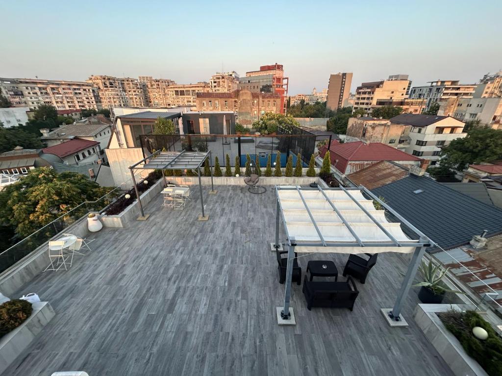 an overhead view of a roof with a table on it at AT Central Apartments in Bucharest