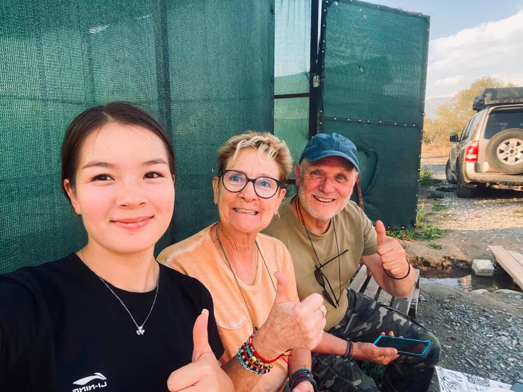 two men and a woman giving the thumbs up at ЭКО балык Седеп юурт 