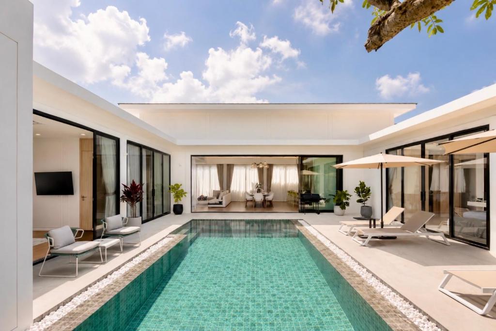 an image of a swimming pool in a villa at Le Da Villas 5BR Bang Tao Beach in Laguna Phuket