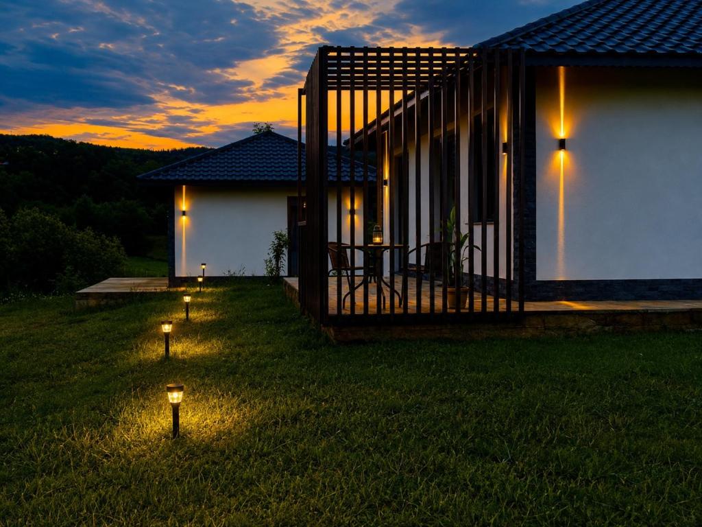 a group of lights in the yard of a house at Mountain House Transalpina in Novaci-Străini