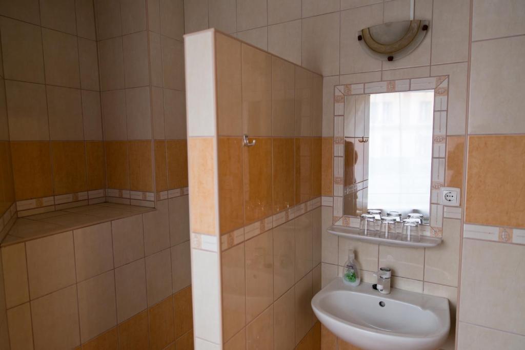 Koupelna v ubytování Taverna panzió